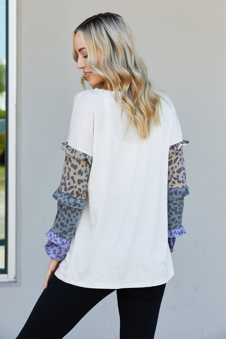 Heimish Full Size Animal Print Ruffle Trim Top